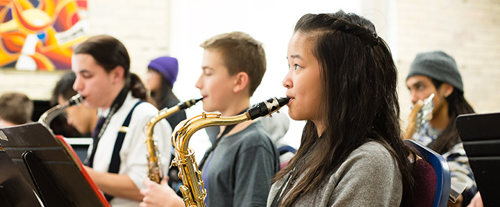 Student playing saxophone