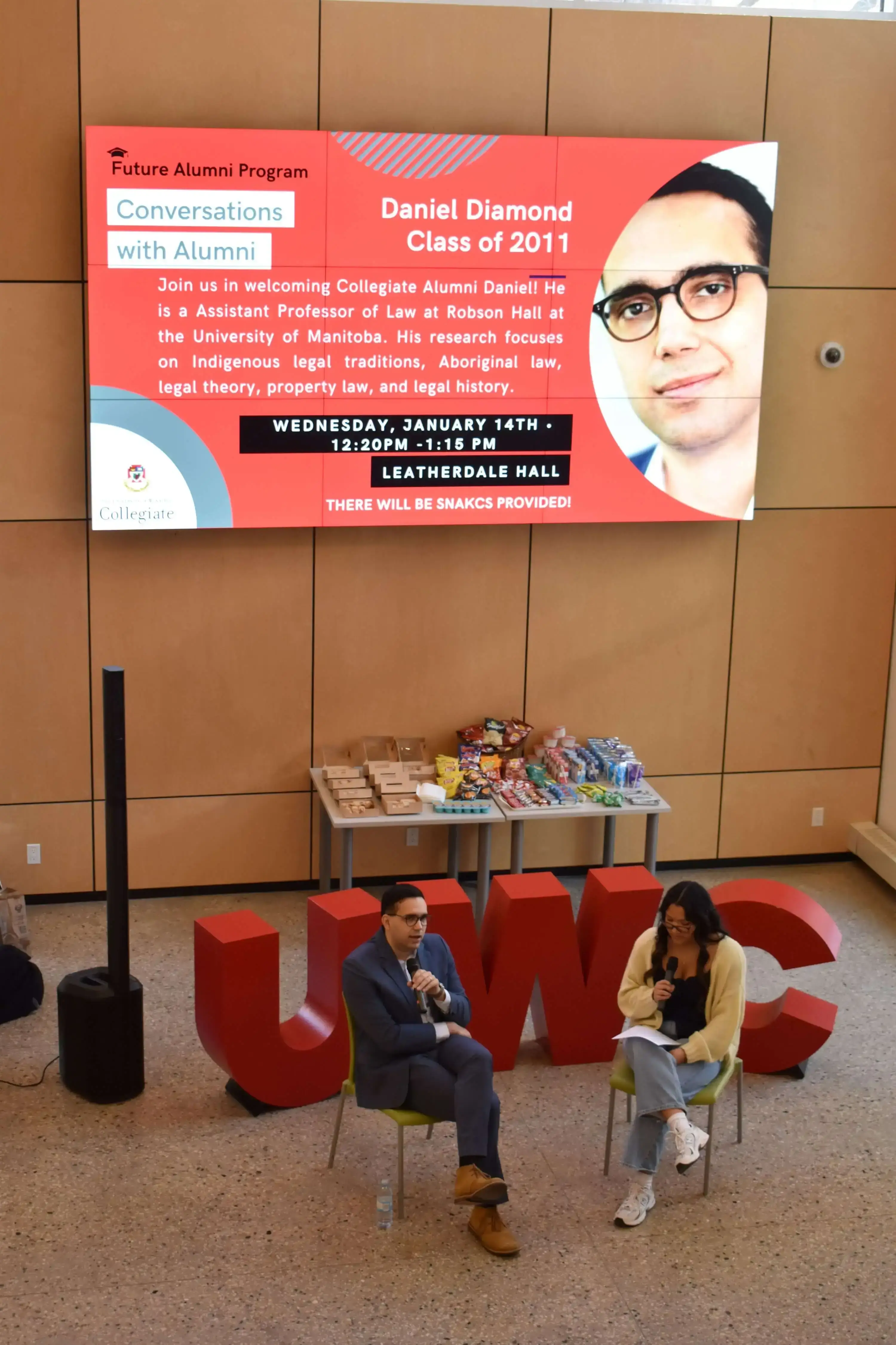 Daniel Diamond being interviewed by Collegiate student Sunshyne P. during a Conversation with Alumni Event