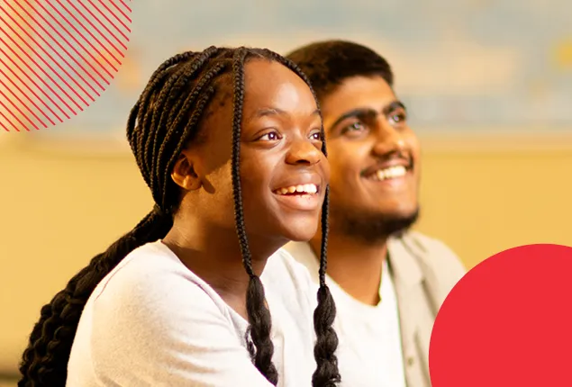 Two students from the side looking up